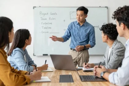 Leader practising effective delegation by transferring responsibility and decision-making authority to a team member