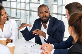 Business leader using written communication to guide a distributed team across different locations