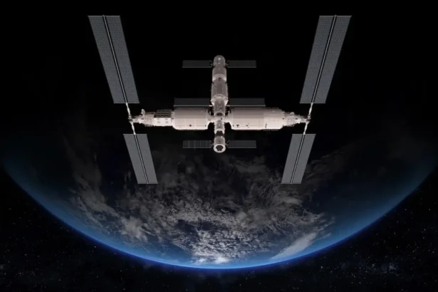 Illustration of data centers in space with solar panels and cooling radiators above Earth.